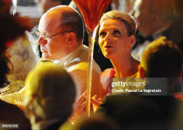 Prince Albert II of Monaco and Charlene Wittstock attend the 61st Monaco Red Cross Ball at the Monte Carlo Sporting Club on July 31, 2009 in Monte...