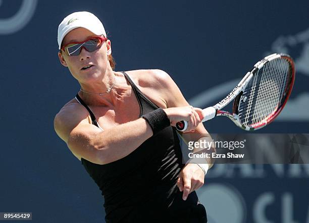 Samantha Stosur of Australia returns a shot to Serena Williams during their quarterfinal match on Day 5 of the Bank of the West Classic July 31, 2009...