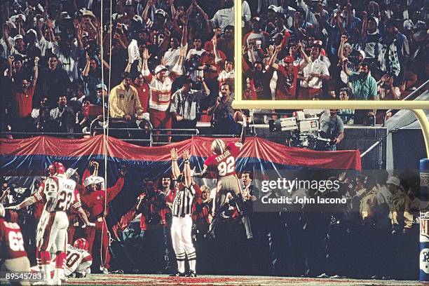 Super Bowl XXIII: Rear view of San Francisco 49ers John Taylor victorious after scoring game winning touchdown vs Cincinnati Bengals. Miami, FL...