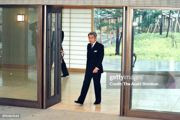 Emperor Akihito is seen on departure for the Hayama Imperial Villa at the Imperial Palace on December 8, 1993 in Tokyo, Japan.