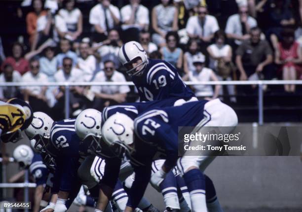 Quarterback Johnny Unitas of the Baltimore Colts calls out the signals at the line of scrimmage during the annual Hall of Fame game on September 6,...