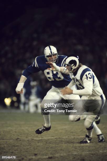 Defensive lineman Ted Hendricks of the Baltimore Colts tries to cover wide receiver Lance Rentzel of the Los Angeles Rams during a game on November...
