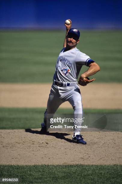 Pitcher Dave Stieb of the Toronto Blue Jays throws a pitch during a game in September, 1990 against the Cleveland Indians at Cleveland Municipal...
