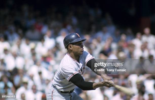 Outfielder Willie Mays of the San Francisco Giants swings at a pitch during the first game of a doubleheader on September 7, 1964 against the...