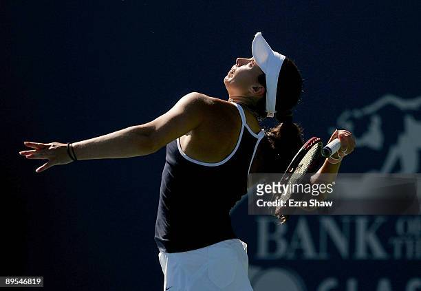 Marion Bartoli of France serves to Jelena Jankovic of Serbia during their quarterfinal match on Day 5 of the Bank of the West Classic July 31, 2009...