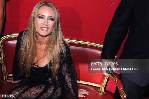 Patrizia D'Addario, the call girl who claims to have slept with Italian Prime Minister Silvio Berlusconi, attends an "I love Silvio" theme party in a...