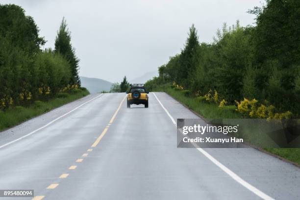 car driving scenic route - car rear view stock pictures, royalty-free photos & images