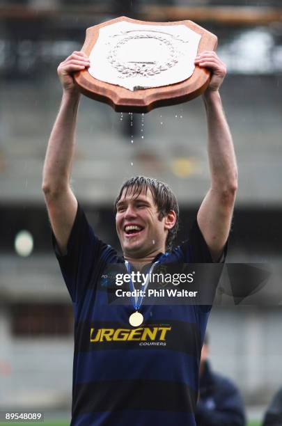 Ponsonby captain Mark Hooper lifts up the Gallagher Shield following their win in the Gallaher Shield Final between Ponsonby and University at Eden...