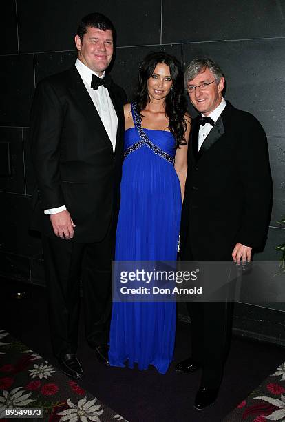 James Packer, wife Erica Packer and Steven Lowy arrive for the Victor Chang Cardiac Research Institute Heart to Heart Ball at the Parkside Ballroom...
