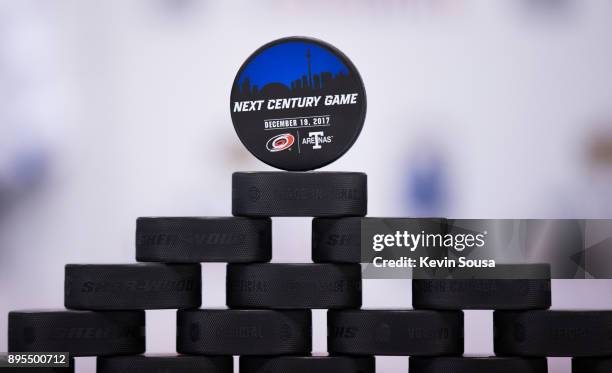 Pucks sit on the boards before the the Leafs play the Carolina Hurricanes at the Air Canada Centre on December 19, 2017 in Toronto, Ontario, Canada....