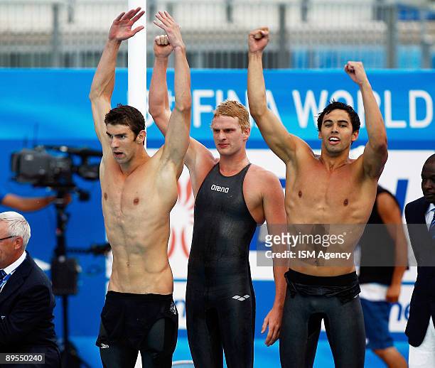 Michael Phelps of United States and the USA Team celebrate the gold medal after winning the Men's 4x200m Freestyle Final, during the 13th FINA World...