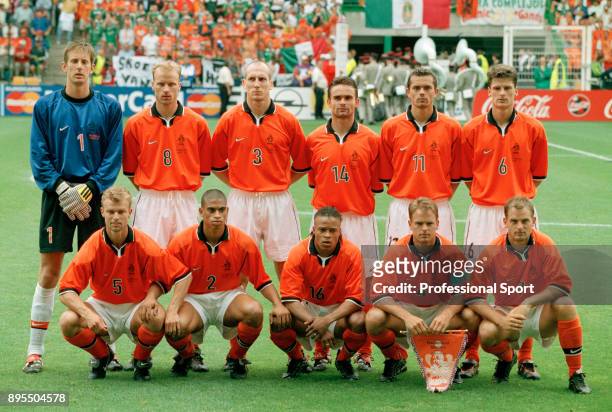 The Netherlands team line up for a group photo before their 1998 FIFA World Cup group match against Mexico at the Stade Geoffroy-Guichard on June 25,...