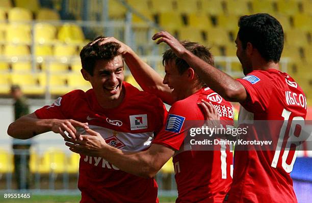 Alex , Sergei Parshivlyuk and Ibson Barreto da Silva of FC Spartak Moscow celebrate scoring a goal during the Russian Football League Championship...