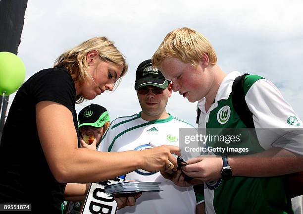 New World Cup 2011 ambassador for the city of Wolfsburg, former German Womens Nationalteam player and World Cup ambassador Britta Carlson , signs...