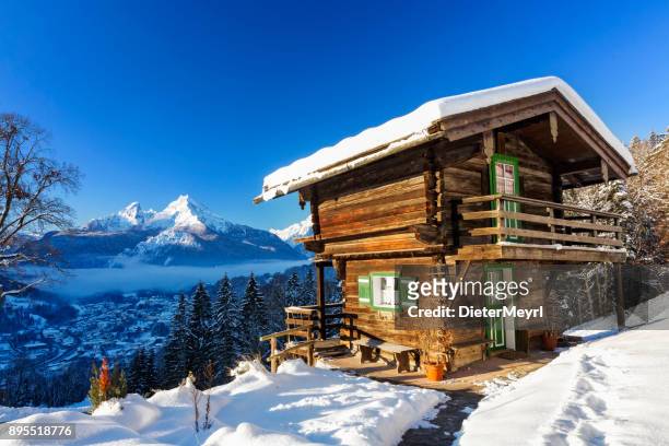 winter wonderland with mountain chalet in the alps - nationalpark berchtesgaden - hut stock pictures, royalty-free photos & images