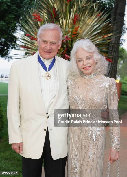 Buzz Aldrin and wife arrive at the 61st Monaco Red Cross Ball at the Monte-Carlo Sporting Club on July 31, 2009 in Monte Carlo, Monaco.