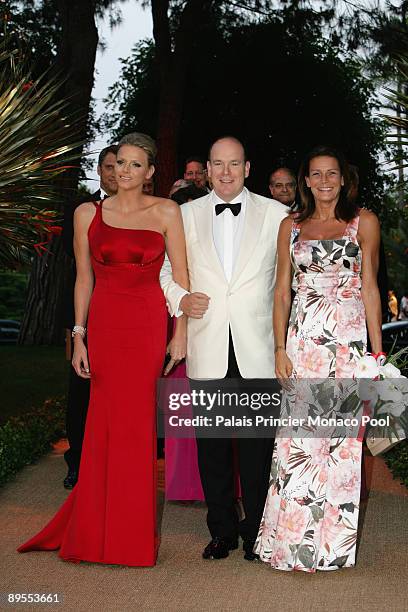 Charlene Wittstock, HSH Prince Albert II of Monaco and HSH Princess Stephanie of Monaco arrive at the 61st Monaco Red Cross Ball at the Monte-Carlo...