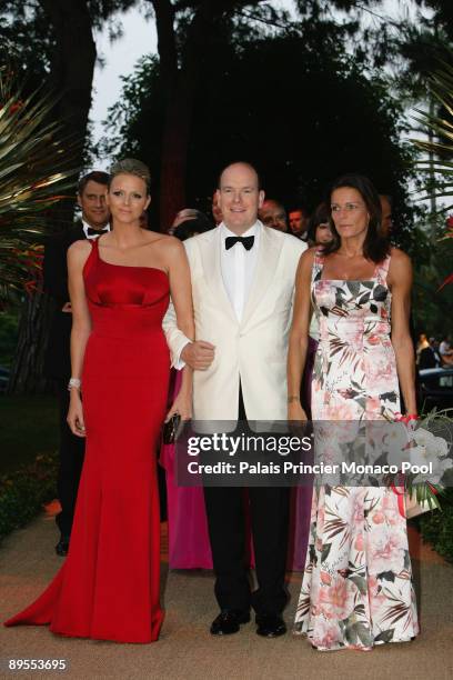 Charlene Wittstock, HSH Prince Albert II of Monaco and HSH Princess Stephanie of Monaco arrive at the 61st Monaco Red Cross Ball at the Monte-Carlo...