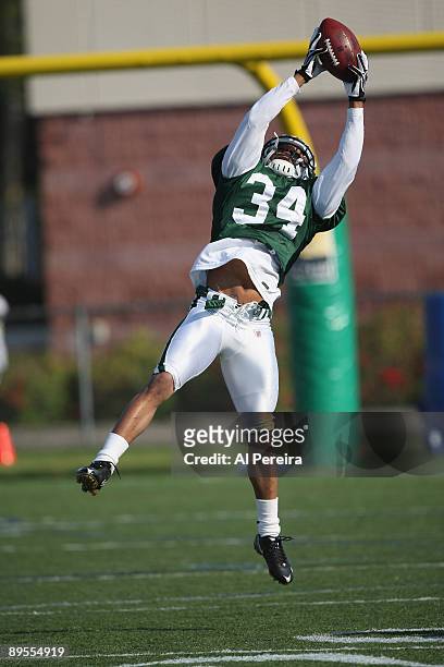 Cornerback Marquice Cole of the New York Jets grabs a ball during New York Jets Training Camp at the State University of New York at Cortland, on...