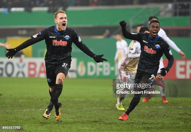 Ben Zolinski of Paderborn celebrates scoring his goal with Christopher Antwi-Adjej during the DFB Cup match between SC Paderborn and FC Ingolstadt at...