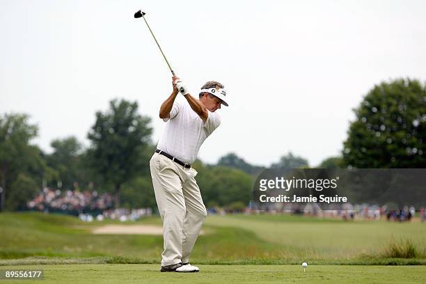 Ameteur Tim Jackson of the USA hits his first shot on the 15th hole during the third round of the 2009 U.S. Senior Open on August 1, 2009 at Crooked...