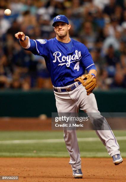 Infielder Alex Gordon of the Kansas City Royals throws over to first for an out against the Tampa Bay Rays during the game at Tropicana Field on...