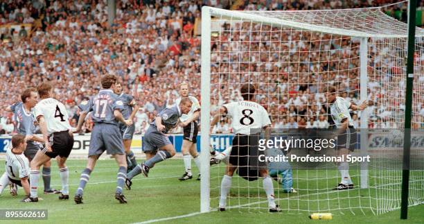 Alan Shearer scores the first goal during the UEFA Euro 96 Semi Final between Germany and England at Wembley Stadium on June 26, 1996 in London,...
