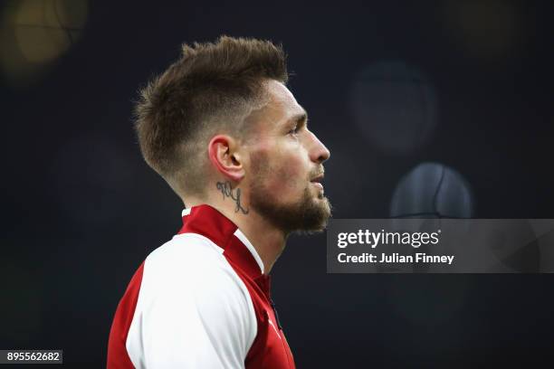 Mathieu Debuchy of Arsenal looks on prior to the Carabao Cup Quarter-Final match between Arsenal and West Ham United at Emirates Stadium on December...