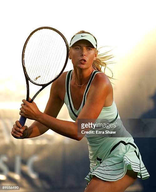 Maria Sharapova of the USA runs to get the ball during her match against Venus Williams of the USA in the quarterfinals on Day 5 of the Bank of the...