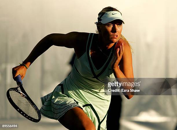 Maria Sharapova of the USA runs to get the ball during her match against Venus Williams of the USA in the quarterfinals on Day 5 of the Bank of the...
