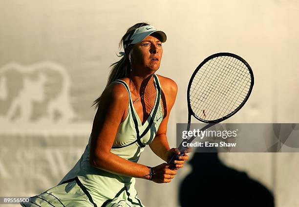 Maria Sharapova of the USA runs to get the ball during her match against Venus Williams of the USA in the quarterfinals on Day 5 of the Bank of the...