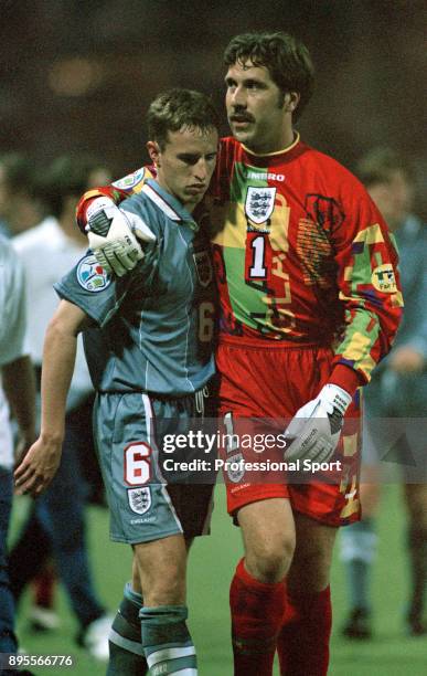 David Seaman of England consoles Gareth Southgate after the UEFA Euro 96 Semi Final between Germany and England at Wembley Stadium on June 26, 1996...