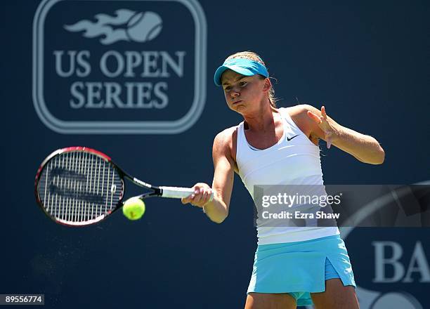 Daniela Hantuchova of Russia returns a shot to Elena Dementieva of Russia during their quarterfinal match on Day 5 of the Bank of the West Classic...