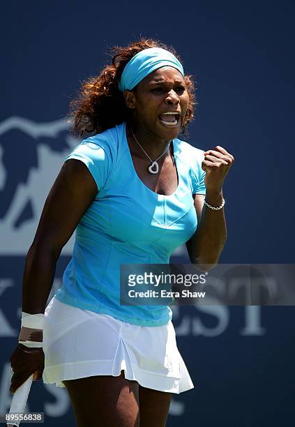 Serena Williams of the USA celebrates winning a point in the second set tie breaker of her match against Melinda Czink of Hungary on Day 4 of the...