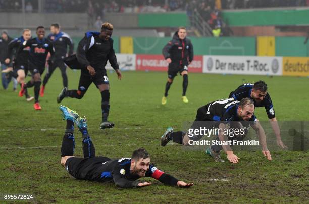 The players of Paderborn celebrate after winning the DFB Cup match between SC Paderborn and FC Ingolstadt at Benteler Arena on December 19, 2017 in...