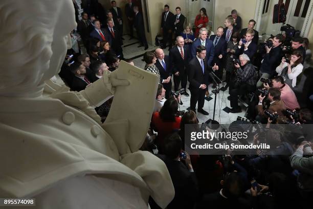 Speaker of the House Paul Ryan is joined by House Republican leaders while talking to reporters following passage of the Tax Cuts and Jobs Act in the...