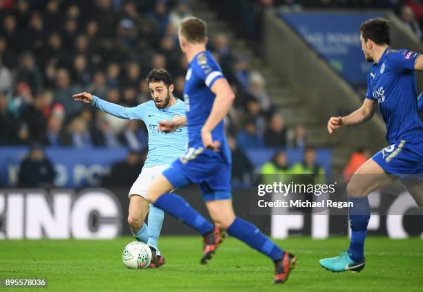 Bernardo Silva of Manchester City scores their first goal during the Carabao Cup Quarter-Final match between Leicester City and Manchester City at...