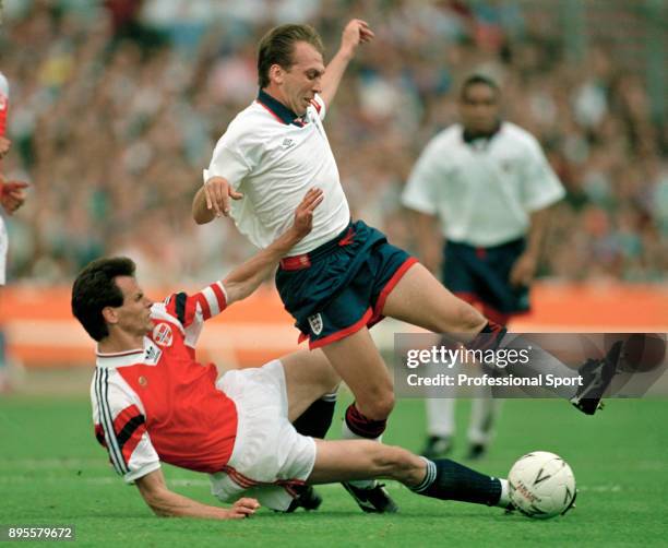 David Platt of England is tackled by Rune Bratseth of Norway during an International Friendly between England and Norway at Wembley Stadium on May...