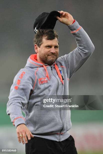 Steffen Baumgart, head coach of Paderborn celebrates after winning the DFB Cup match between SC Paderborn and FC Ingolstadt at Benteler Arena on...