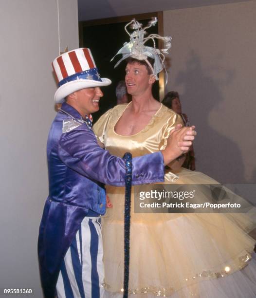 England's Darren Gough and team physiotherapist David Roberts in fancy dress for the team's Christmas Day lunch during the 2nd Test match between...