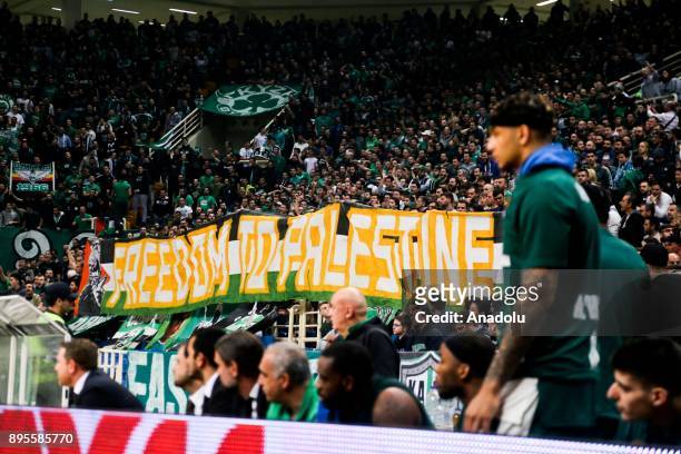 Supporters of Panathinaikos Superfoods Athens hold a banner reading "Freedom to Palestine" during the Turkish Airlines Euroleague basketball match...