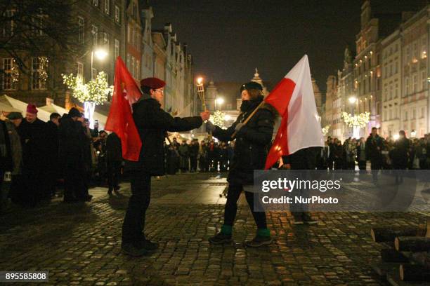 Scouts are seen during the Peace Light of Bethlehem transfer ceremony are seen in Gdansk, Poland on 19 December 2017 The Peace Light of Bethlehem is...