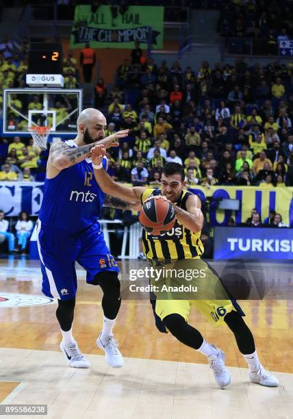 Kostas Sloukas of Fenerbahce Dogus in action against Pero Antic of Crvena Zvezda during the Turkish Airlines Euroleague basketball match between...