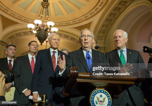 Senate Majority Leader Mitch McConnell speaks to the press after their Weekly Policy Luncheons on December 19, 2017 in Washington, DC. The House...