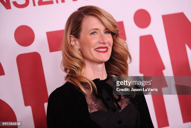 Actress Laura Dern attends the premiere of "Downsizing" at Regency Village Theatre on December 18, 2017 in Westwood, California.