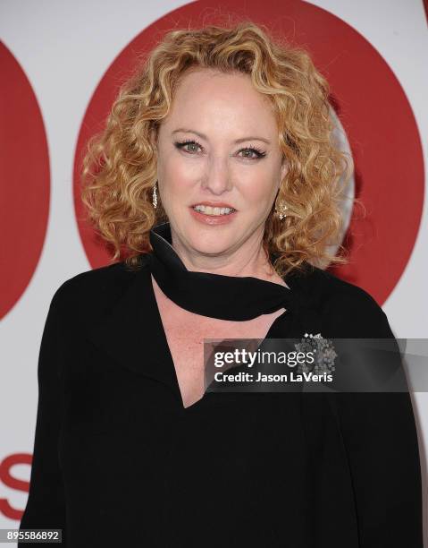 Actress Virginia Madsen attends the premiere of "Downsizing" at Regency Village Theatre on December 18, 2017 in Westwood, California.