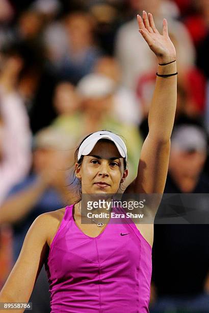 Marion Bartoli of France waves to the crowd after defeating Samantha Stosur of Australia in their semifinal match on Day 6 of the Bank of the West...