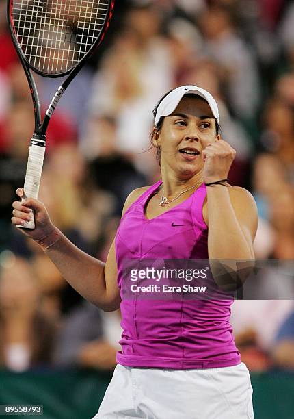 Marion Bartoli of France celebrates match point over Samantha Stosur of Australia after their semifinal match on Day 6 of the Bank of the West...