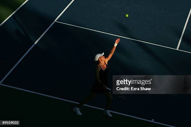 Samantha Stosur of Australia serves to Marian Bartoli of France during their semifinal match on Day 6 of the Bank of the West Classic August 1, 2009...
