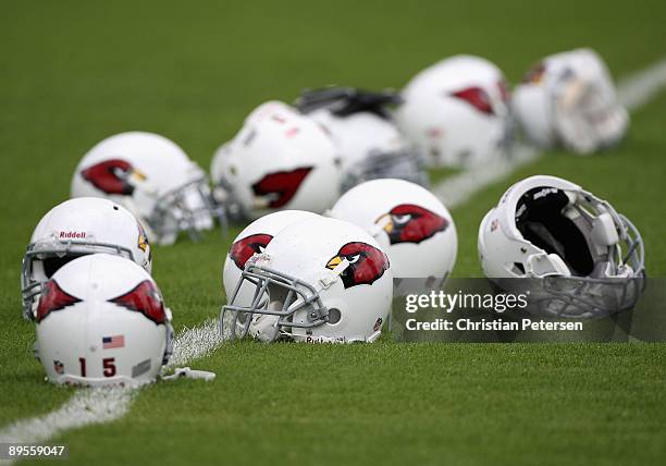 Arizona Cardinal's helmets sit on the field during the team training camp at Northern Arizona University on July 31, 2009 in Flagstaff, Arizona.